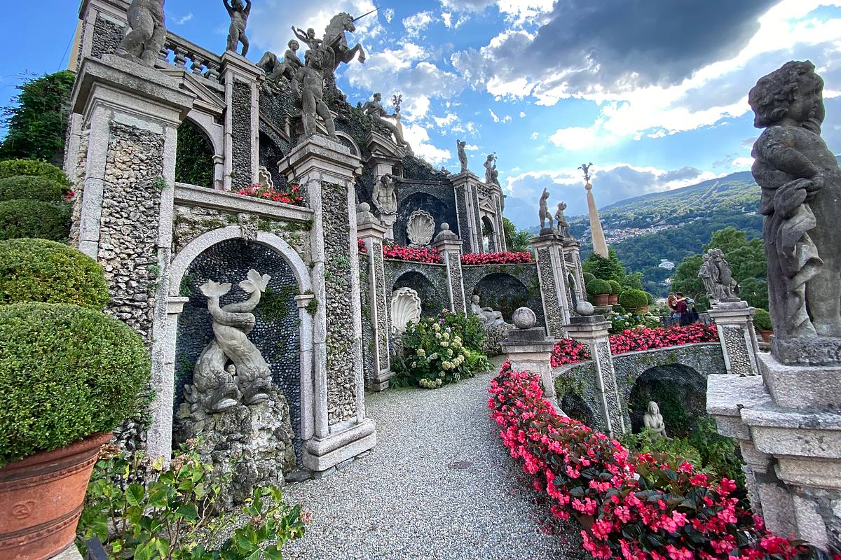 The terraced baroque gardens of Isola Bella with statues and blooming flowers above Lake Maggiore, Piedmont, Italy